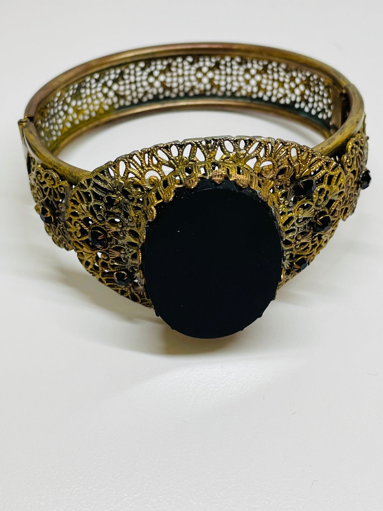 Gold Hinge Bracelet with a Black Glass Stone Devil's Details 