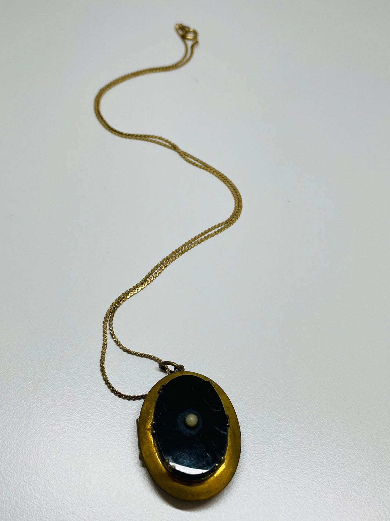 Gold Oval Locket with Black Stone and Gold Filled Chain Devil's Details 