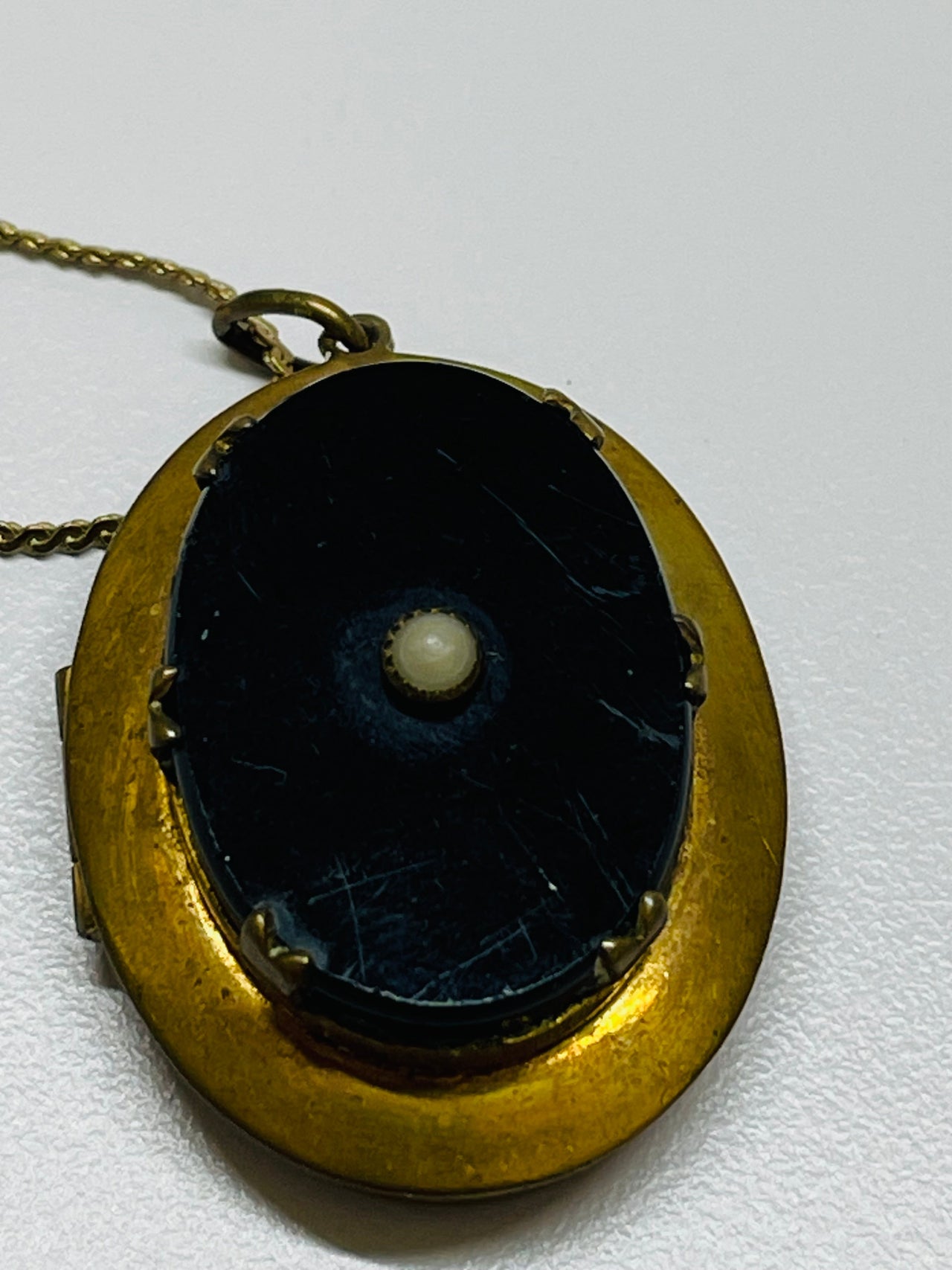 Gold Oval Locket with Black Stone and Gold Filled Chain Devil's Details 