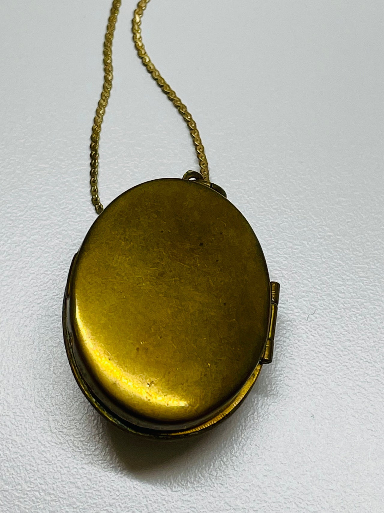 Gold Oval Locket with Black Stone and Gold Filled Chain Devil's Details 